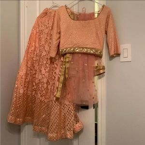 Peach lengha choli with 3/4 sleeve blouse